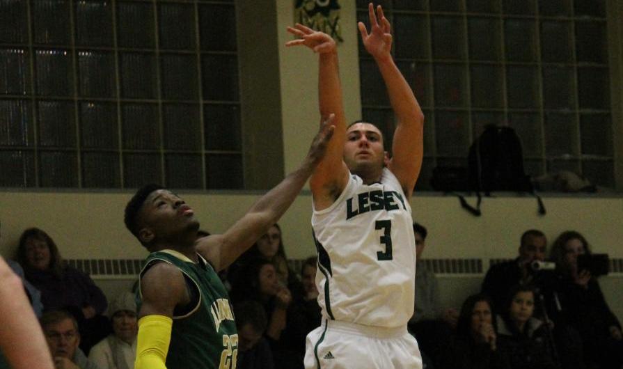Regis Pulls Away in Second Half to Top Men's Basketball