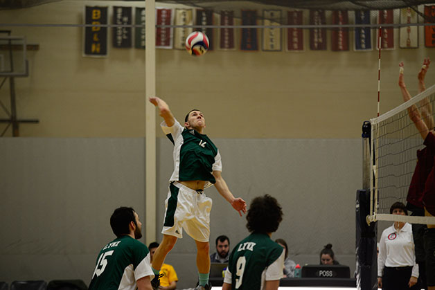 Regis Swings Past Men's Volleyball